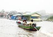 Foto: Cilts sievietes un saldūdens delfīnu meklējumi Borneo